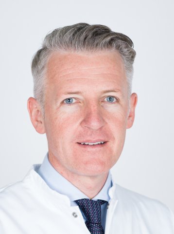 Ein Porträt vom Arzt Christian Kammerlander, der direkt und freundlich blickt.